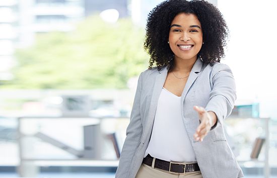 Woman holding her hand out to shake.